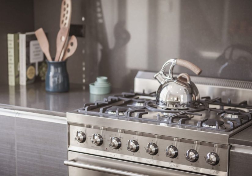 How to Clean Sticky Grease From Any Stovetop, According to Cleaning Pros